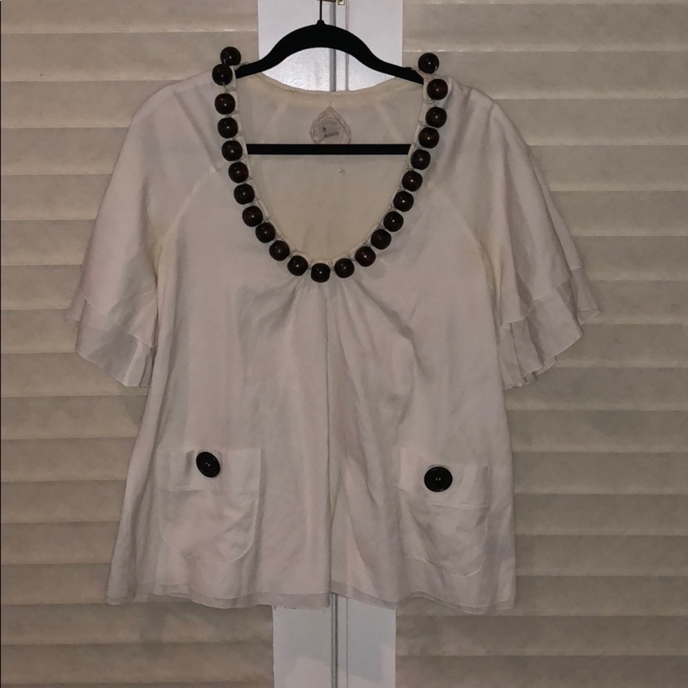 Anthropologie flared top with wood detail